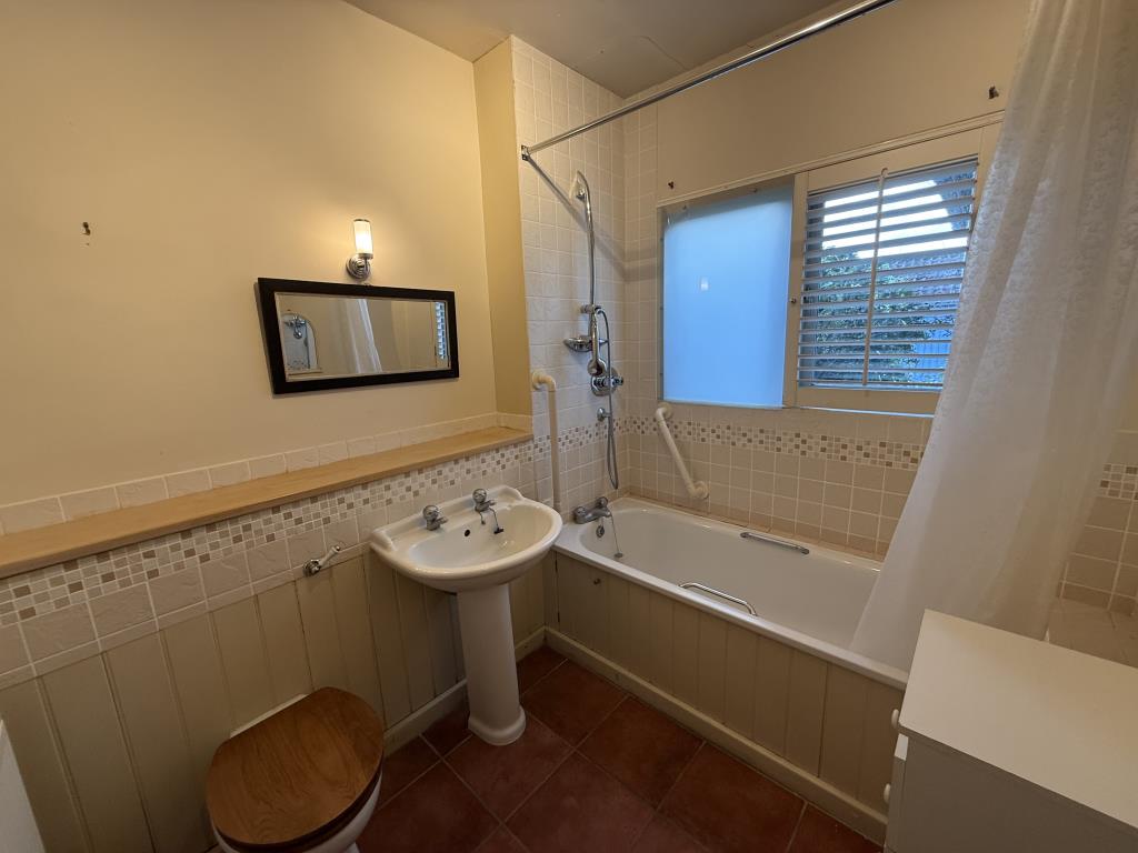 Lot: 124 - BUNGALOW FOR REPAIR AND REFURBISHMENT IN SOUGHT AFTER AREA - General view of bathroom with WC